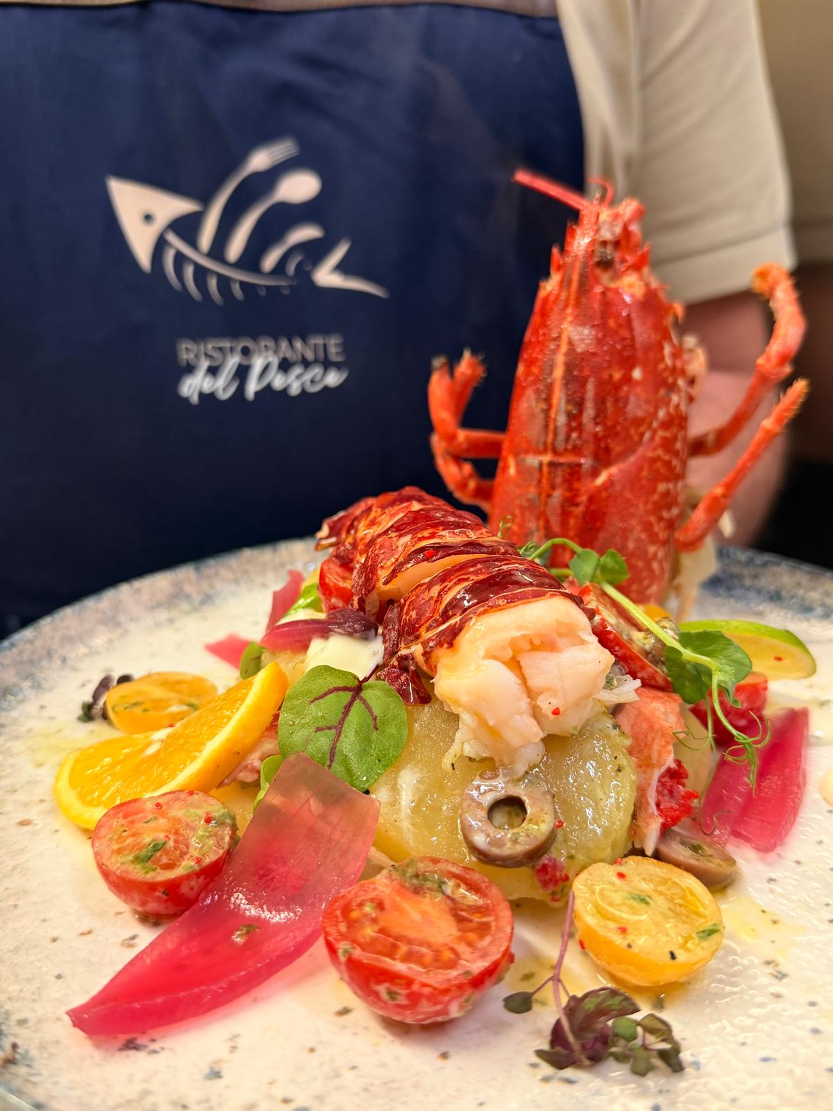 Aragosta con agrumi e pomodorini